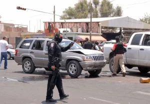 1-22-sicarios-embosca-a-policias-de-durango-1879html-cuartoscuro-9783html-f355205d-a2c0-47a1-91f5-a09d8ea59cb2ljnimgndimagefullsize